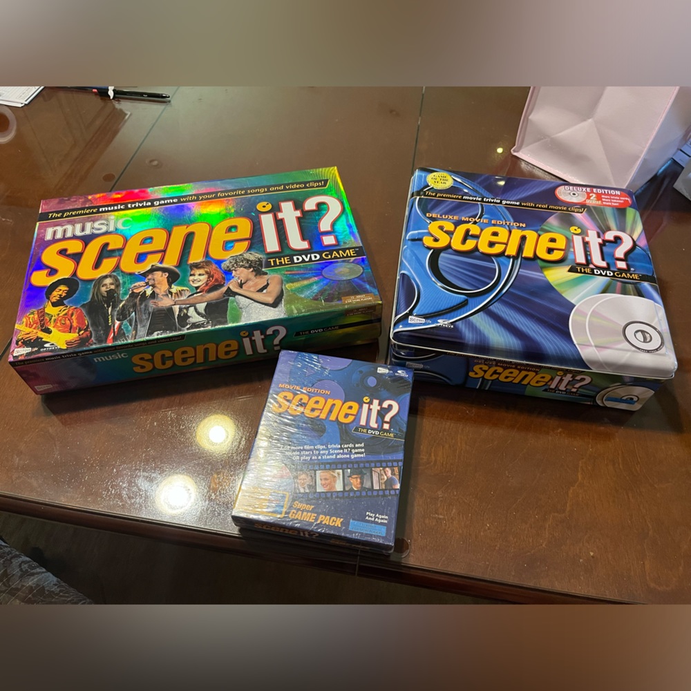 Scene it? deluxe movie Trivia game with expansion pack and Scene It? Music